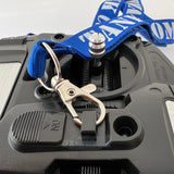 A blue polyester lanyard with white 'tank commander' text and a metal 'lobster claw' clip.